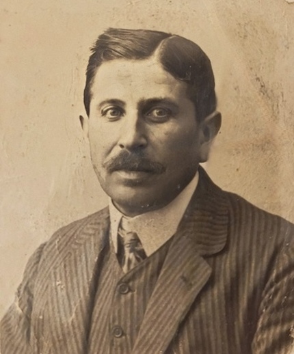 Historical portrait photo of young man in sepia